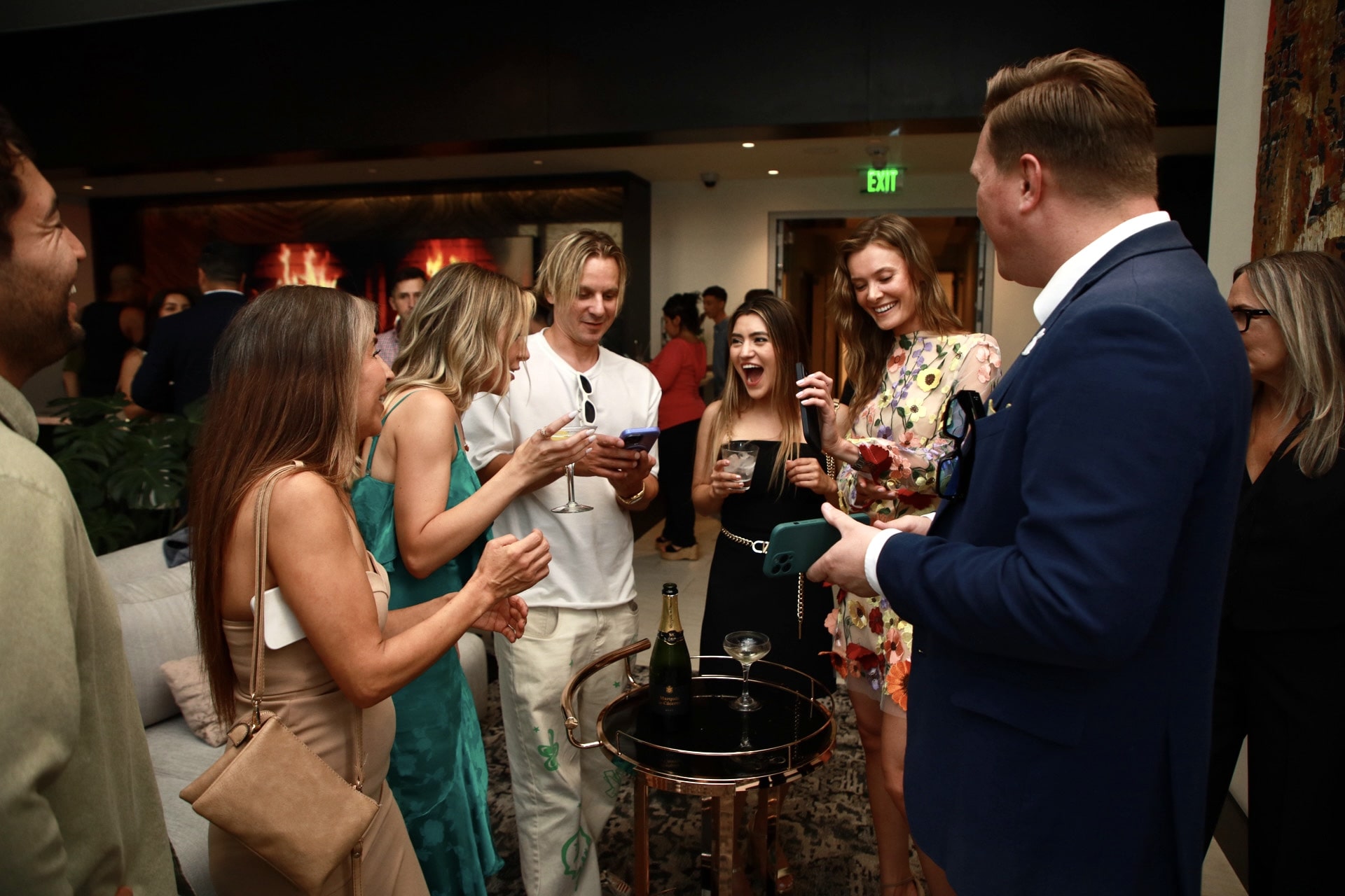 Scott Syme performing close-up magic at a cocktail reception