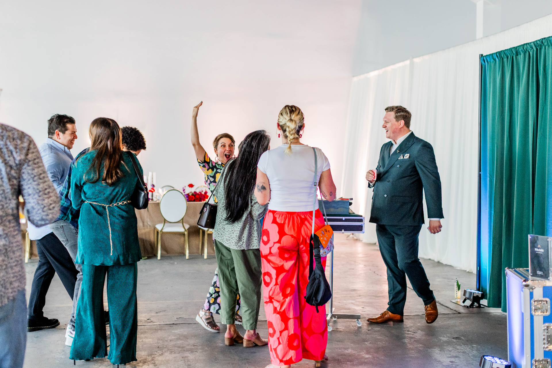 Corporate event attendees reacting to a magic performance