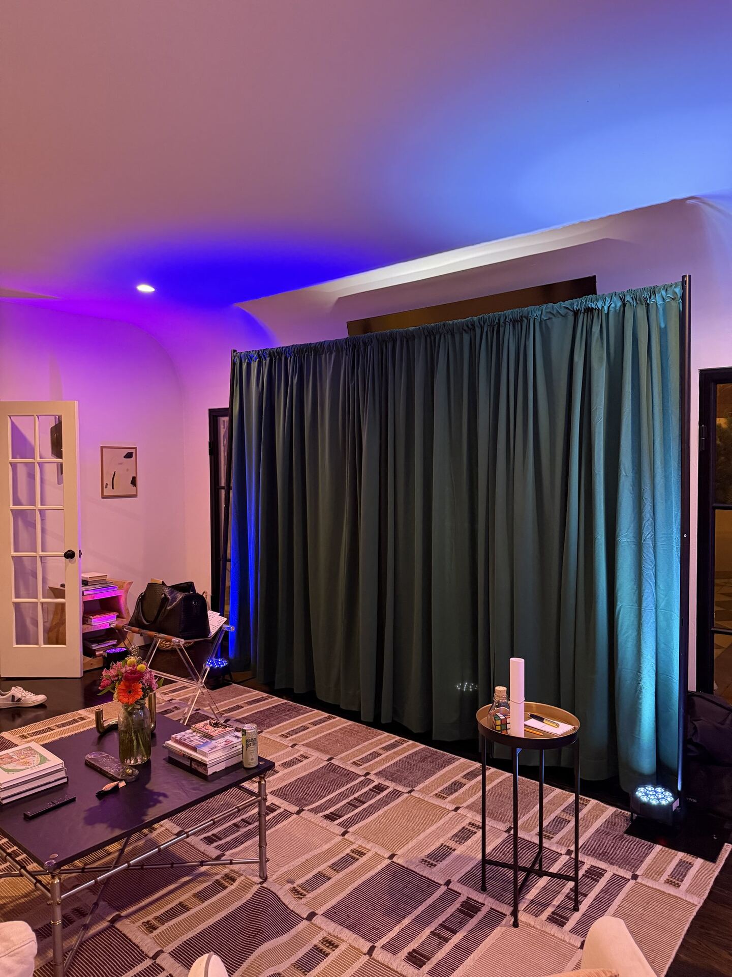 White Rabbit LA event setup with emerald drapes and cinematic lighting